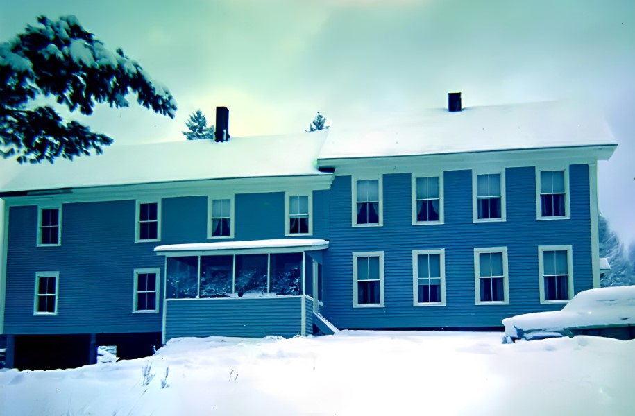 The house in the snow.