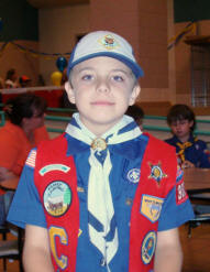 Zach makes the Cub Scout rank of Bear.