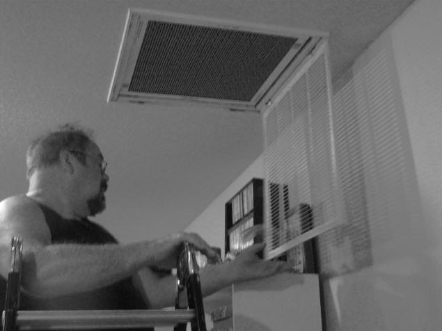 Yours truly changes an HVAC filter.