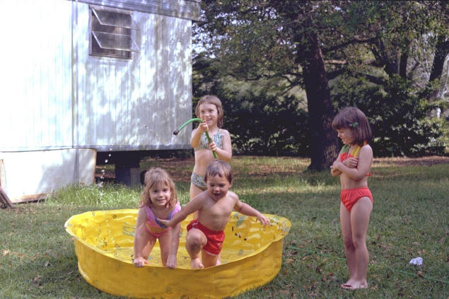 Dottie sprays cold water on Jenny and Johnny while Karen keeps out of it.