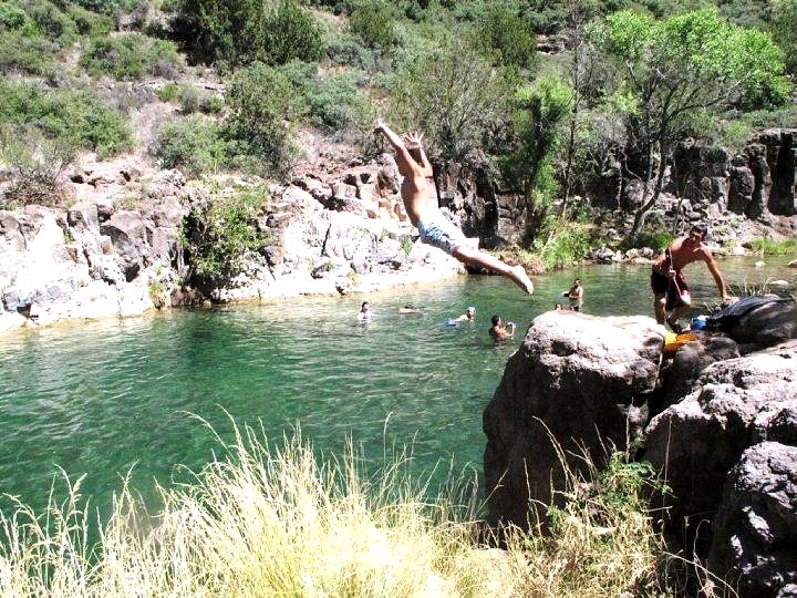 Zach diving into Fossil Creek.