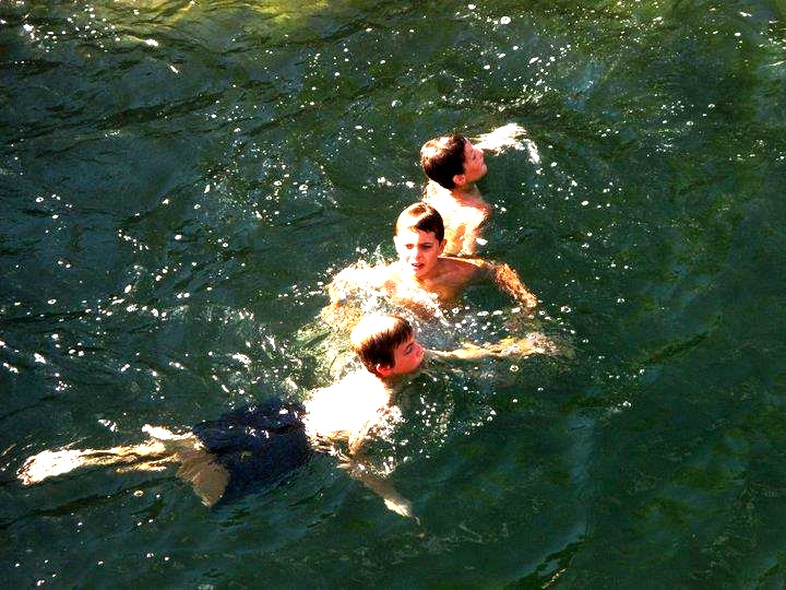 Josh, Zach and Lakota swimming in the clean, clear waters of Fossil Creek.