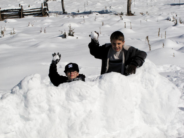 Lane and Zach armed with snowballs.