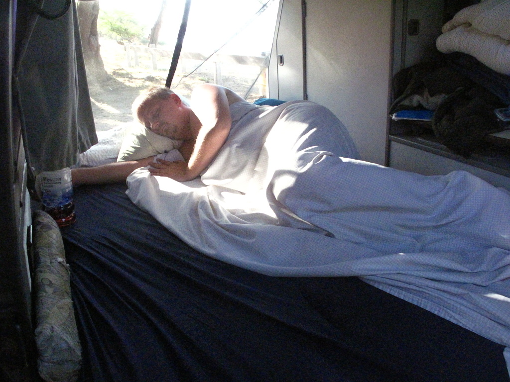 The Angel Jason asleep in the camper.