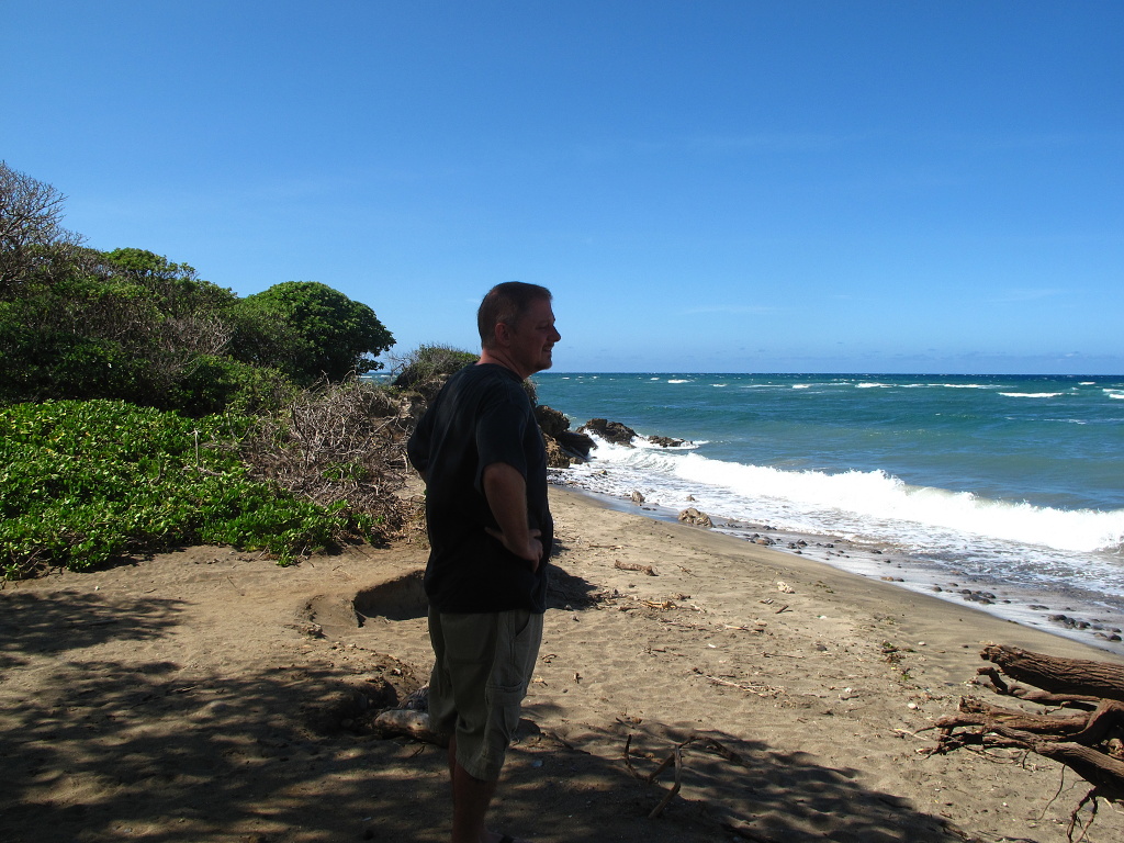 Jason overlooks a deserted beach on West Maui's north shore.