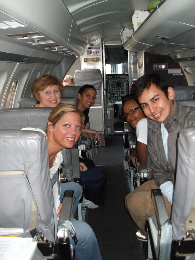 Karen, fron left, with some classmates in Flight Attendant school.