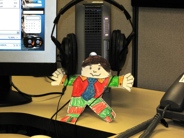 Flat Stanley listens to the stereo.