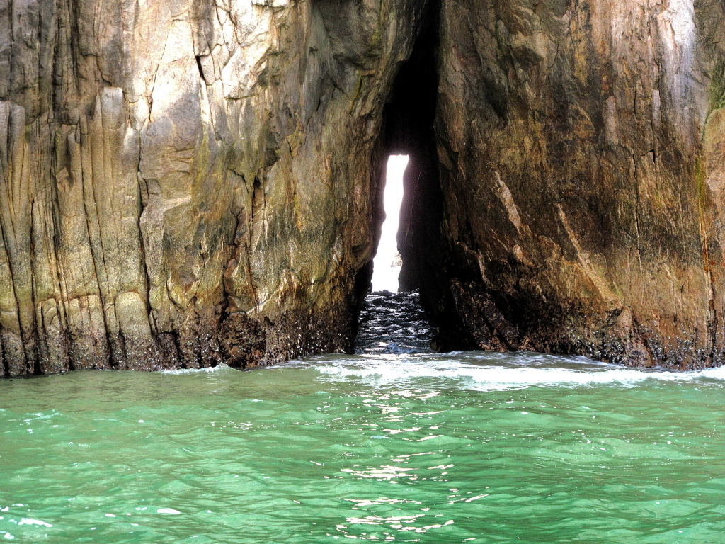 The waters of the Pacific rush through this cleft to intermingle with those of the Sea of Cortez.