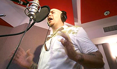 Hip-hop artist Pitbull records the National Anthem…in SPanish.